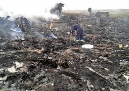 Международные эксперты отказались работать на месте крушения Boeing-777 в Украине