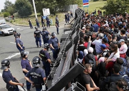 Европарламент поддержал предложение о распределении 120 тысяч беженцев