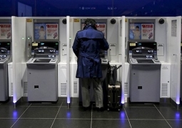 В Японии за два часа обокрали 1400 банкоматов