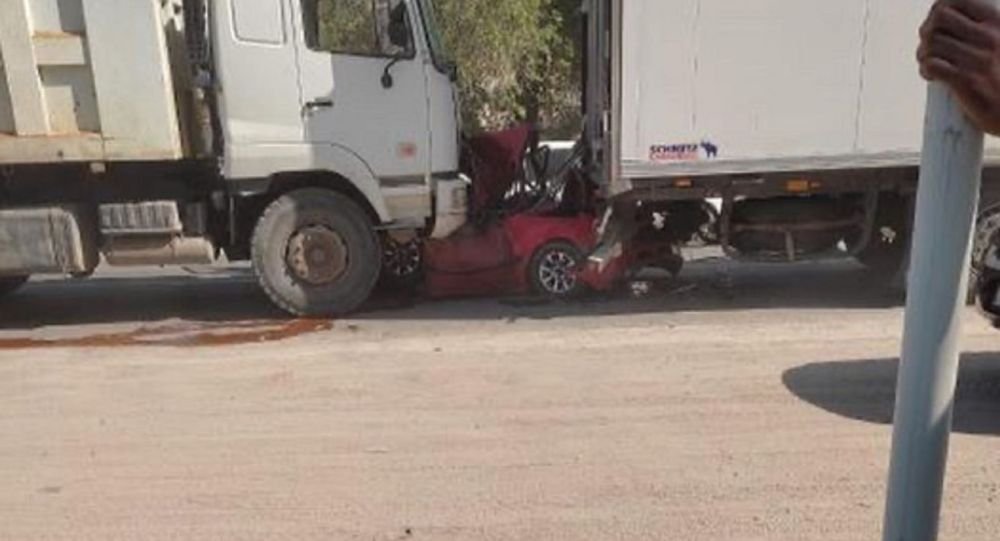 Алматы облысында кептелісте тұрған Mazda-ны екі жүк көлігі мыжып тастады 